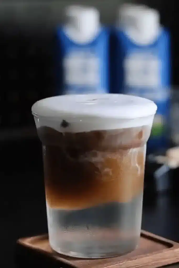 Coconut Cloud Coffee with perfectly layered espresso and fluffy cream cap