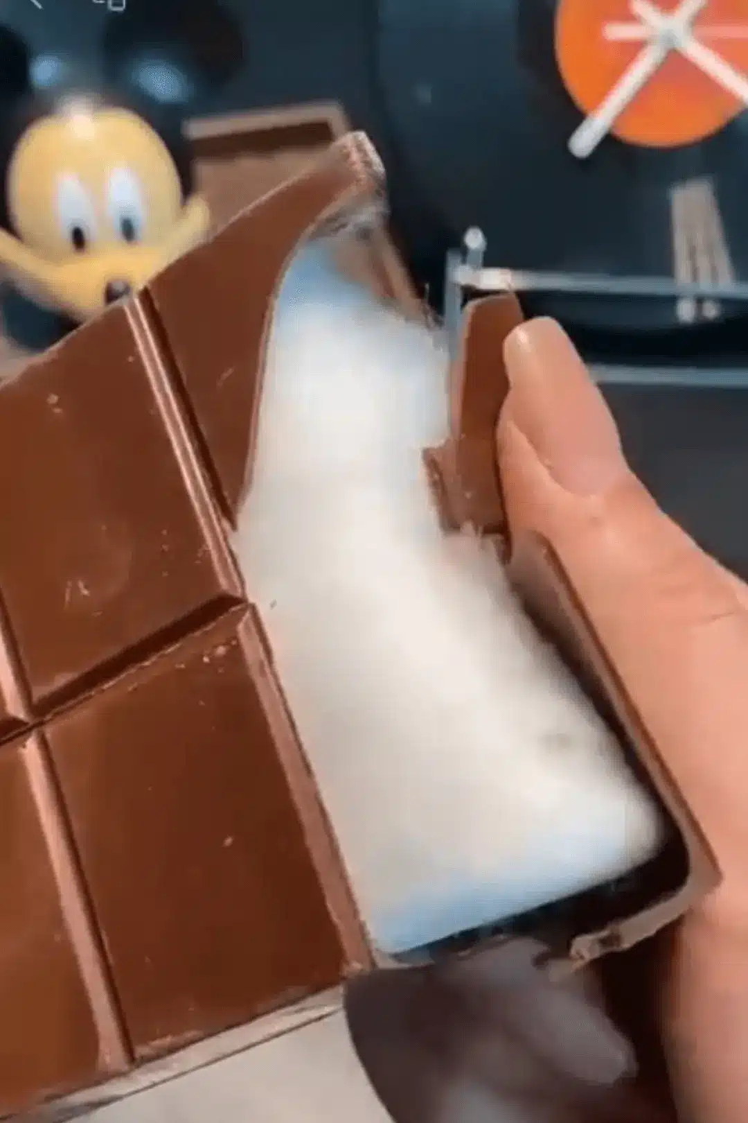 Inside of angel hair chocolate bar showing cotton candy layer