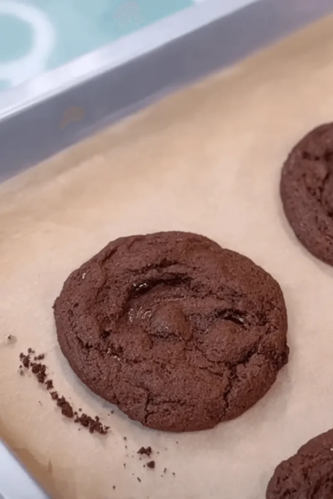 Baked chocolate cookie base for Moonbeam Ice Cream Crumbl Cookie