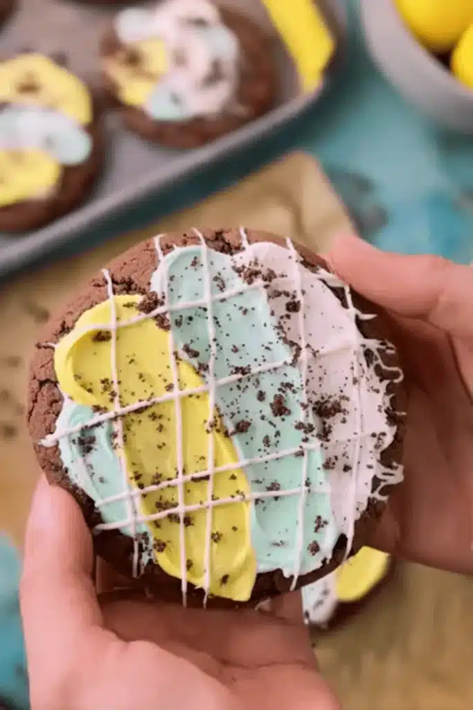 Moonbeam Ice Cream Crumbl Cookie with blue, lemon, and marshmallow frosting swirl