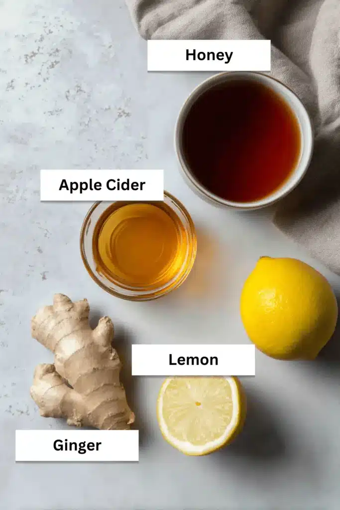 Overhead shot of viral Japanese Mounjaro ingredients including lemon, ginger, honey, and apple cider vinegar