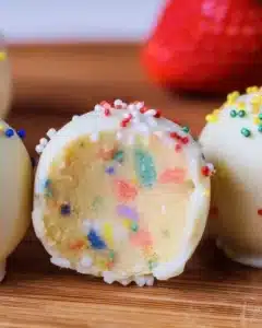 Delicious no-bake cake batter truffles decorated with colorful sprinkles