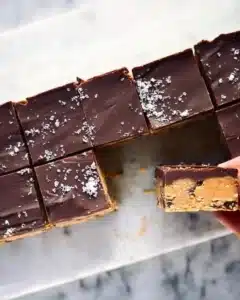 Delicious no-bake cookie dough bars topped with chocolate chips