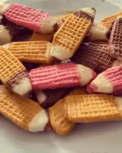 Delicious Wafer Pencil Cookies on a decorative plate